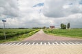 Road and meadows in the Zuidplaspolder at Nieuwerkerk aan den IJssel, one of the lowest parts of europ with 21 ft below sea level.