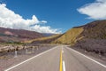 A road in the middle of the colorful Andes Mountain Range.
