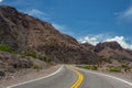 A road in the middle of the colorful Andes Mountain Range.