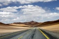 Road in Moon Valley dramatic landscape at Sunset, Atacama Desert, Chile Royalty Free Stock Photo