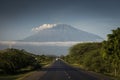 A road with Mount Meru in background, Tanzania