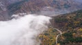 Road In Mountain With A Lot Of Fog Royalty Free Stock Photo