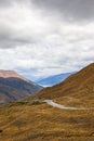 The road among the mountain peaks of the South Island. Queenstown neighborhood. New Zealand Royalty Free Stock Photo