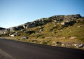 Road through mountain plateau Valdresflye, Jotunheimen Royalty Free Stock Photo