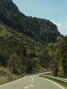 ROAD BETWEEN MOUNTAINS A BEAUTIFUL SPRING DAY