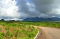 Road in mountains. The cloudy sky. Africa, Mozambique. Royalty Free Stock Photo