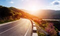 Road in mountains. Kalabaka region. Meteora. Greece. Empty asphalt road with glowing perfect sky and sunlight. Landscape Royalty Free Stock Photo