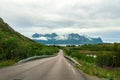 Road in the mountains by the sea beyond the arctic circle in Norway Royalty Free Stock Photo