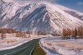 Road mountains snow winter trees Royalty Free Stock Photo