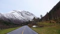 Road and Mountains in Valldola valley on Trollstigen route in snow in Norway Royalty Free Stock Photo