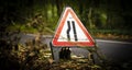 Road narrows on left road warning sign - UK highway code Royalty Free Stock Photo