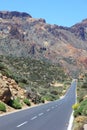 Road in desert highway travel landscape blue sky trip sand mountains volcanic volcano rural lane route sun drive nature rock dry Royalty Free Stock Photo