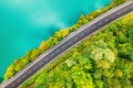 The road near turquoise lake. Aerial landscape. The road by the lake in Switzerland. Summer landscape from the air. Royalty Free Stock Photo