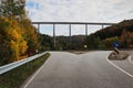 Road next to colorful fall leaves