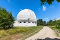 Road next to the Observatory building with a retractable dome for the coronograph