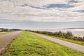 a road next to a body of water Royalty Free Stock Photo