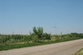 Road in the Odessa region of Ukraine with a view of the windmills