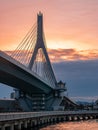 Road over the bridge at the pier during sunset time Royalty Free Stock Photo