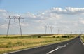 Road over the Dobrogea plain, Romania Royalty Free Stock Photo