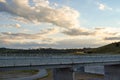 Road over the Jindabyne Dam wall with mountain background