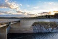 Road over the Jindabyne Dam wall with mountain background Royalty Free Stock Photo