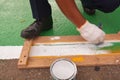 Road painter man worker marking street lines Royalty Free Stock Photo