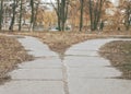 The road in the park diverge in different directions, the road f Royalty Free Stock Photo