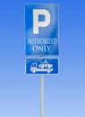 Road parking sign isolated against a blue sky with authorized Royalty Free Stock Photo