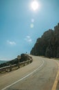 Road passing through rocky landscape in a sunny day Royalty Free Stock Photo