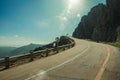 Road passing through rocky landscape in a sunny day Royalty Free Stock Photo