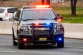 Road patrol police car on highway scene with emergency lights Royalty Free Stock Photo