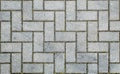 Road paved with sidewalk tiles. texture of light gray bricks