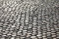 Road pavement made with many smooth pebbles without people Royalty Free Stock Photo
