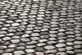 Road pavement made with smooth pebbles without people Royalty Free Stock Photo