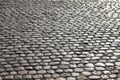 road pavement made with many smooth pebbles without people Royalty Free Stock Photo