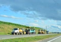 Road Paving Machine at highway. Construction machinery for laying new asphalt and road repair. Road works or activity on the Royalty Free Stock Photo