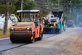Road paving and rolling
