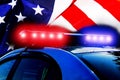 Road police patrol car with lightbar alarm emergency on the street of city at night. Flashing blue and red police car led lights Royalty Free Stock Photo