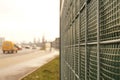 Close-up on the construction. The road is protected against noise emission by noise-absorbing barrier also called a noise wall,