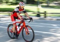 Road racing biker training with blurred background