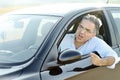 Road rage concept - irritated man screams and gestures while driving the car Royalty Free Stock Photo