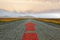 The road and the red arrow