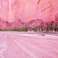 Road and red rock on the bottom of the canyon. Royalty Free Stock Photo