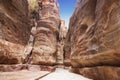 The road between the red rocks of the Siq gorge to the ancient city of Petra, Royalty Free Stock Photo