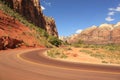 Road between red rocks, Zion National Park, Utah, USA Royalty Free Stock Photo