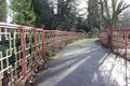 Road with a red and yellow fence Royalty Free Stock Photo