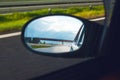The road is reflected in the rearview mirror Royalty Free Stock Photo