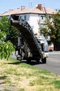 Road repair asphalt cutting