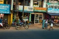 Road, residential buildings and people in their daily life in the city center of kochin