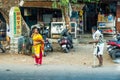 Road, residential buildings and people in their daily life in the city center of kochin